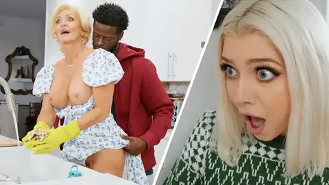 Platinum-blonde GILF is penetrated in the standing doggy-style-fashion