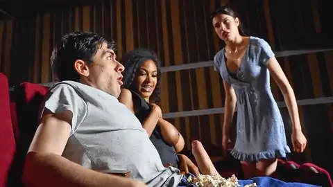 Public bi-racial in the cinema with an dark-hued